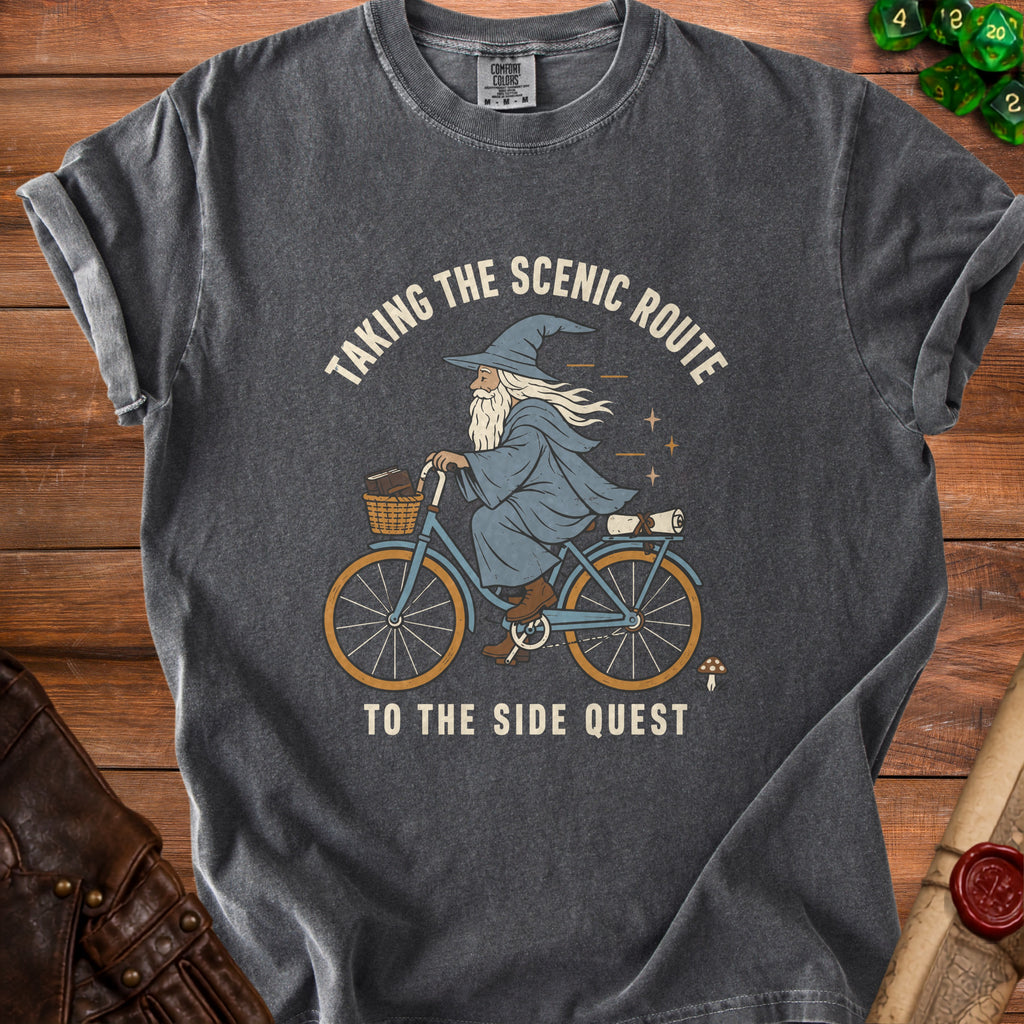 Wizard on bicycle with basket and books, "Taking the Scenic Route to the Side Quest" text.