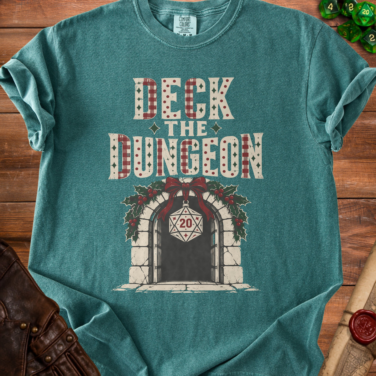 T-shirt with "Deck the Dungeon" text and a D20 die ornament.