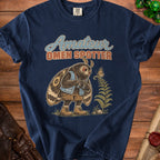 Moth character wearing binoculars and shorts, with "Amateur Omen Spotter" text.
