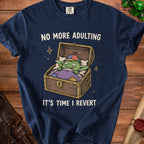 Navy t-shirt with a graphic of a green creature in a chest saying "NO MORE ADULTING IT'S TIME I REVERT".