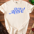 Cream t-shirt with blue "Out of Mana!" graphic, shown on wooden surface.