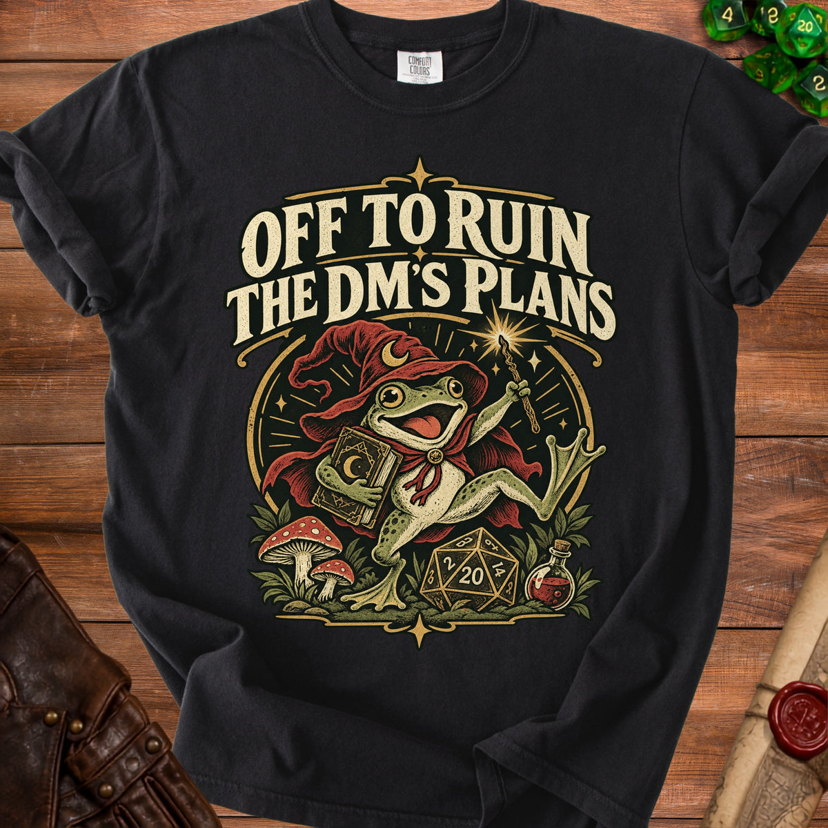 Black t-shirt with a frog wizard holding a book and wand, "Off to Ruin the DM's Plans" text.