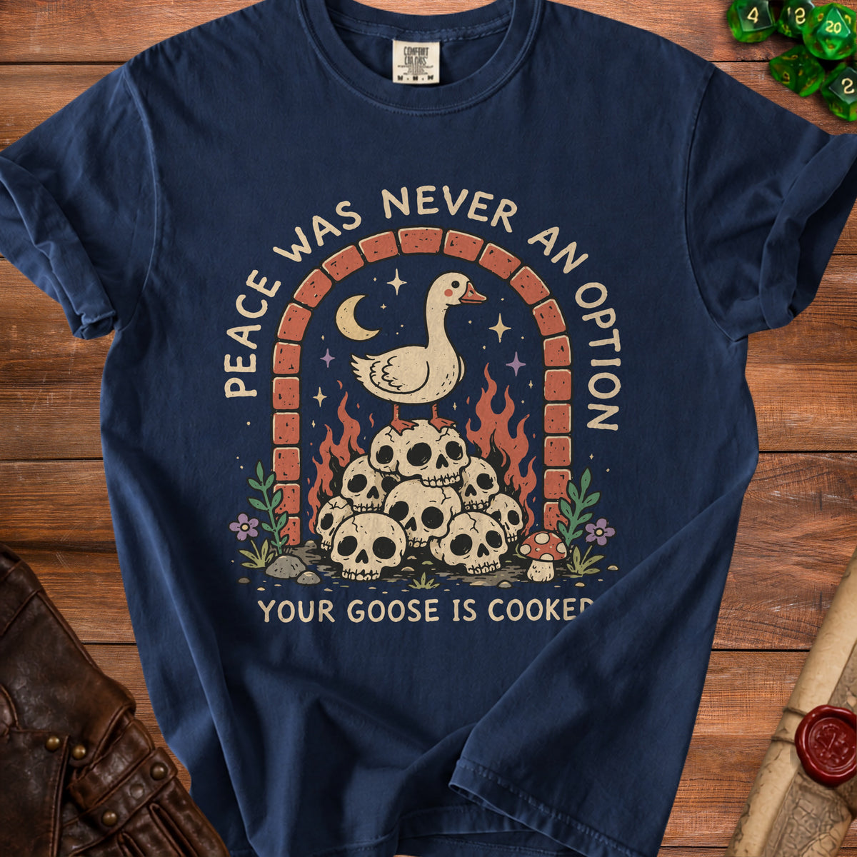 Navy t-shirt with graphic of a goose on skulls, "Peace Was Never an Option" and "Your Goose Is Cooked" text.