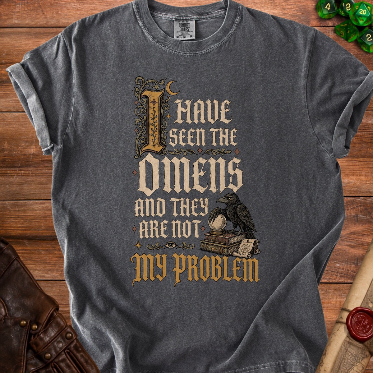 Dark grey t-shirt with text "I HAVE SEEN THE OMENS AND THEY ARE NOT MY PROBLEM".