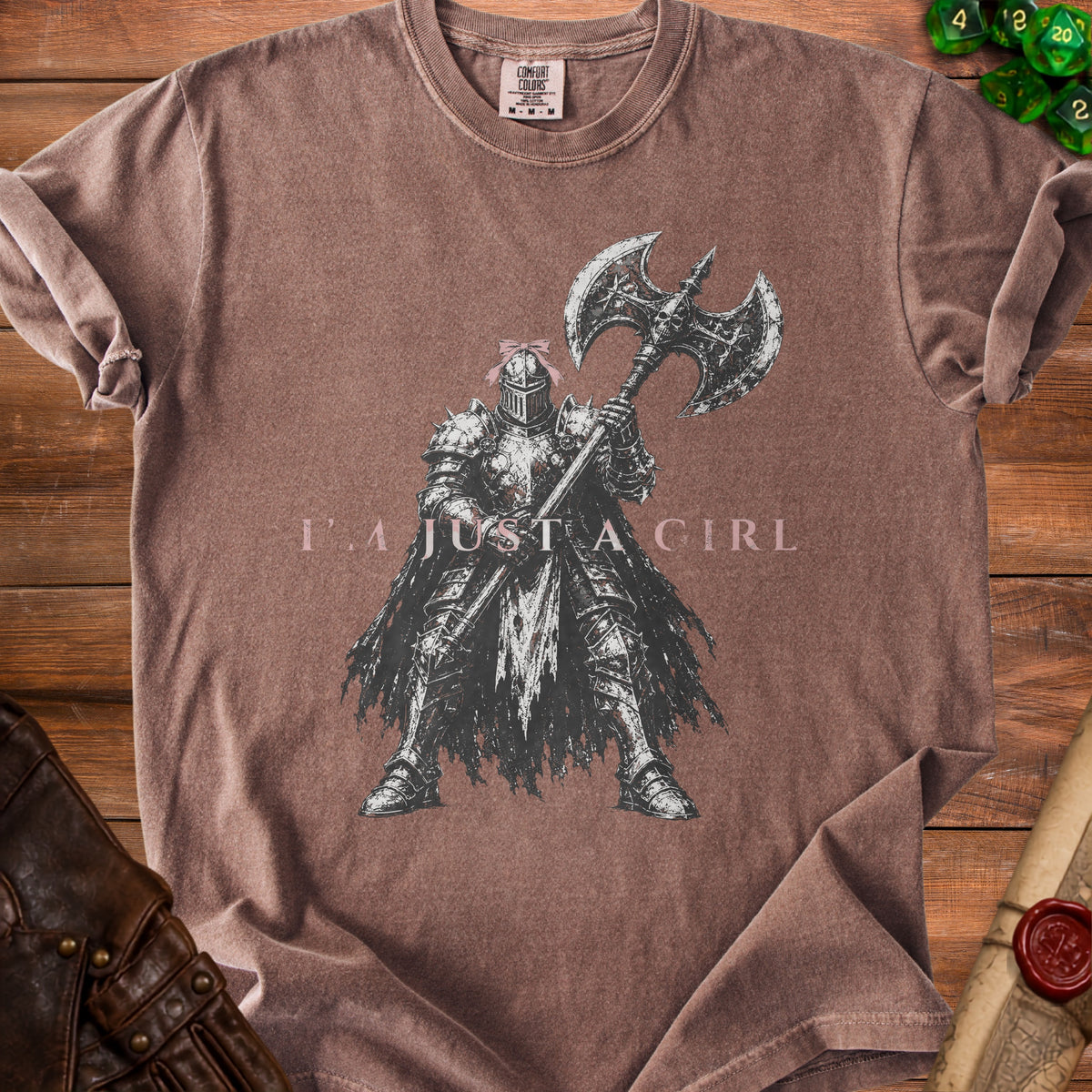 Brown t-shirt with knight graphic and "I'M JUST A GIRL" text.