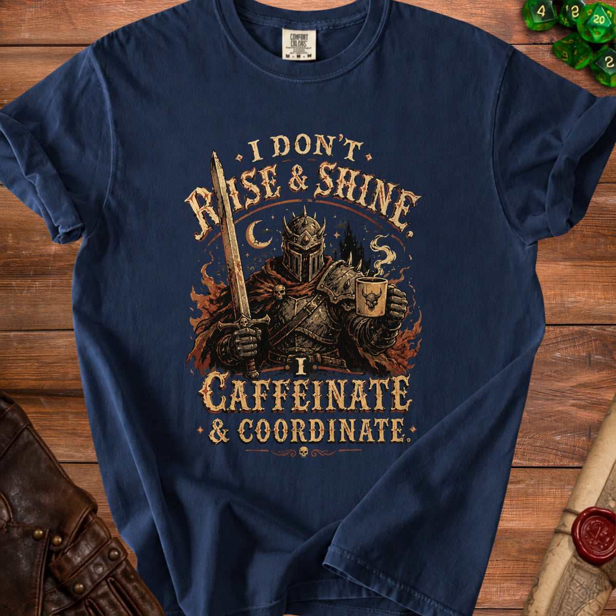 Navy t-shirt with knight holding sword and coffee, reading "I Don't Rise & Shine, I Caffeinate & Coordinate."
