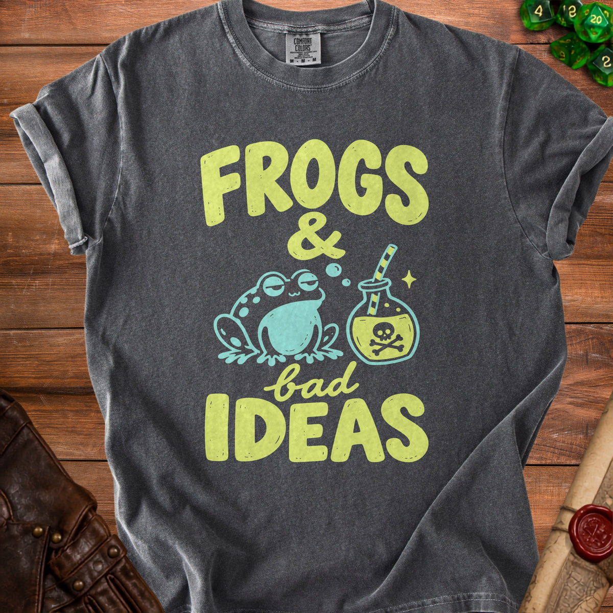 Dark gray t-shirt with yellow text "Frogs & bad IDEAS" and a frog with a potion.