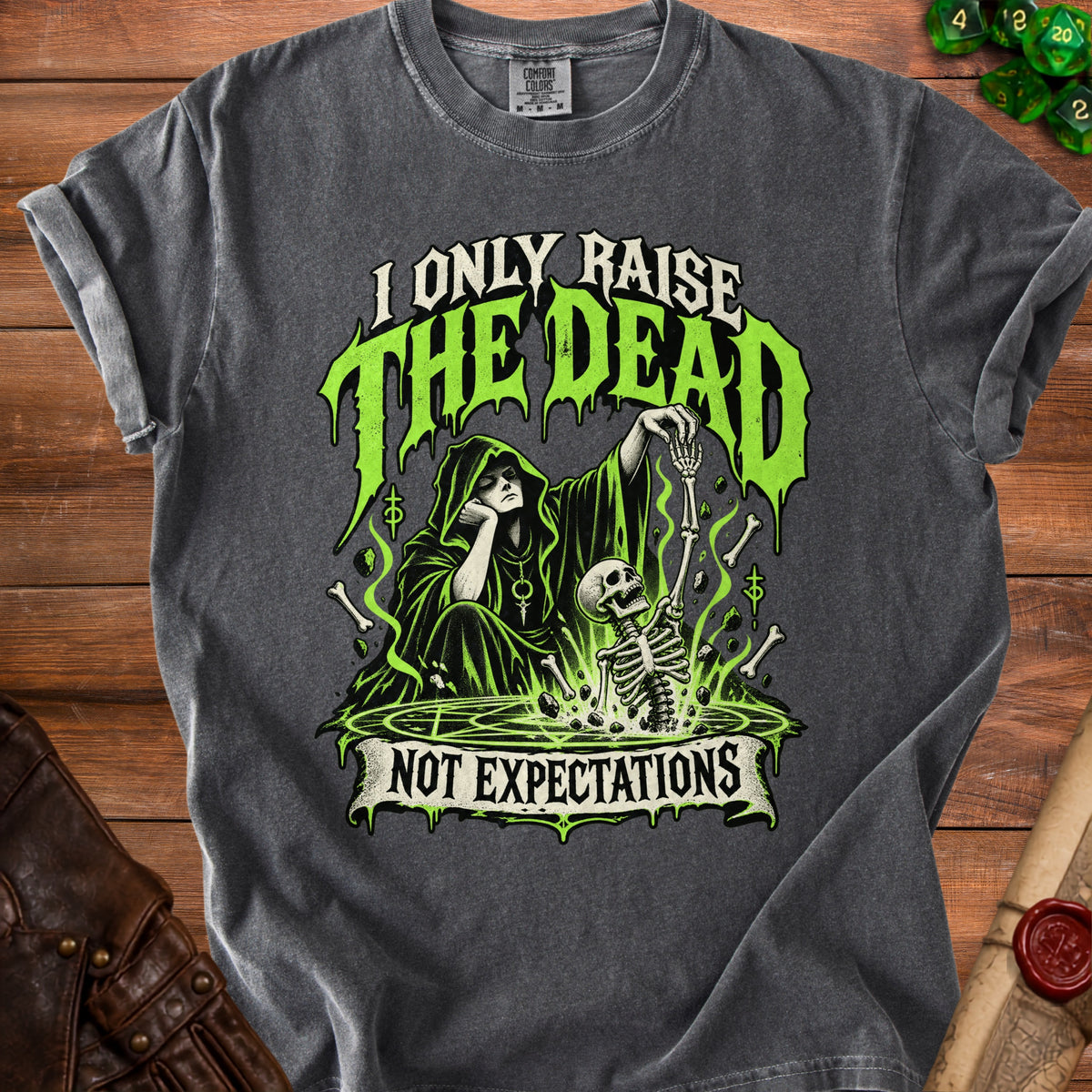Dark grey t-shirt with "I Only Raise The Dead Not Expectations" graphic.