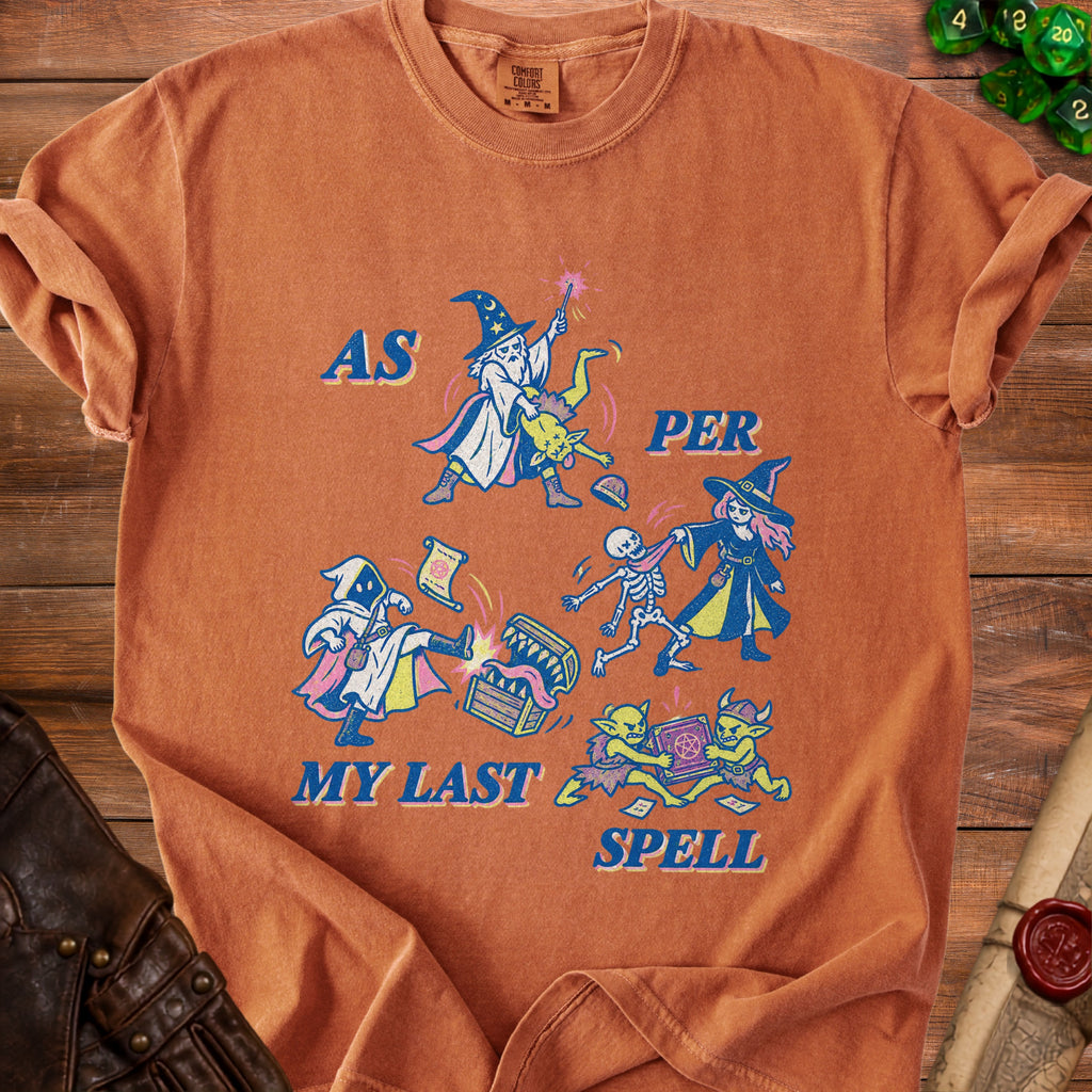 Orange t-shirt with "AS PER MY LAST SPELL" text and fantasy battle graphics.