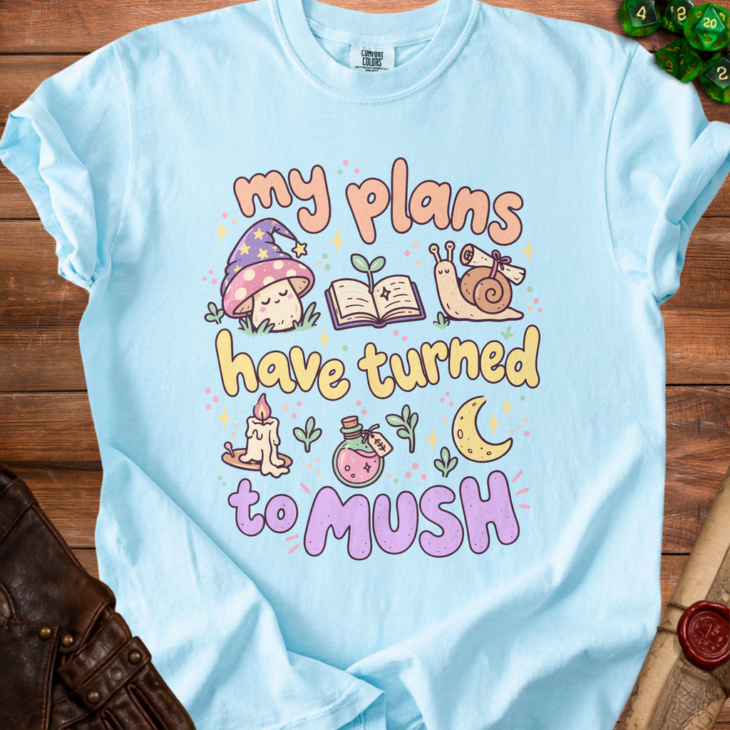 Light blue t-shirt with "my plans have turned to mush" text and whimsical illustrations.