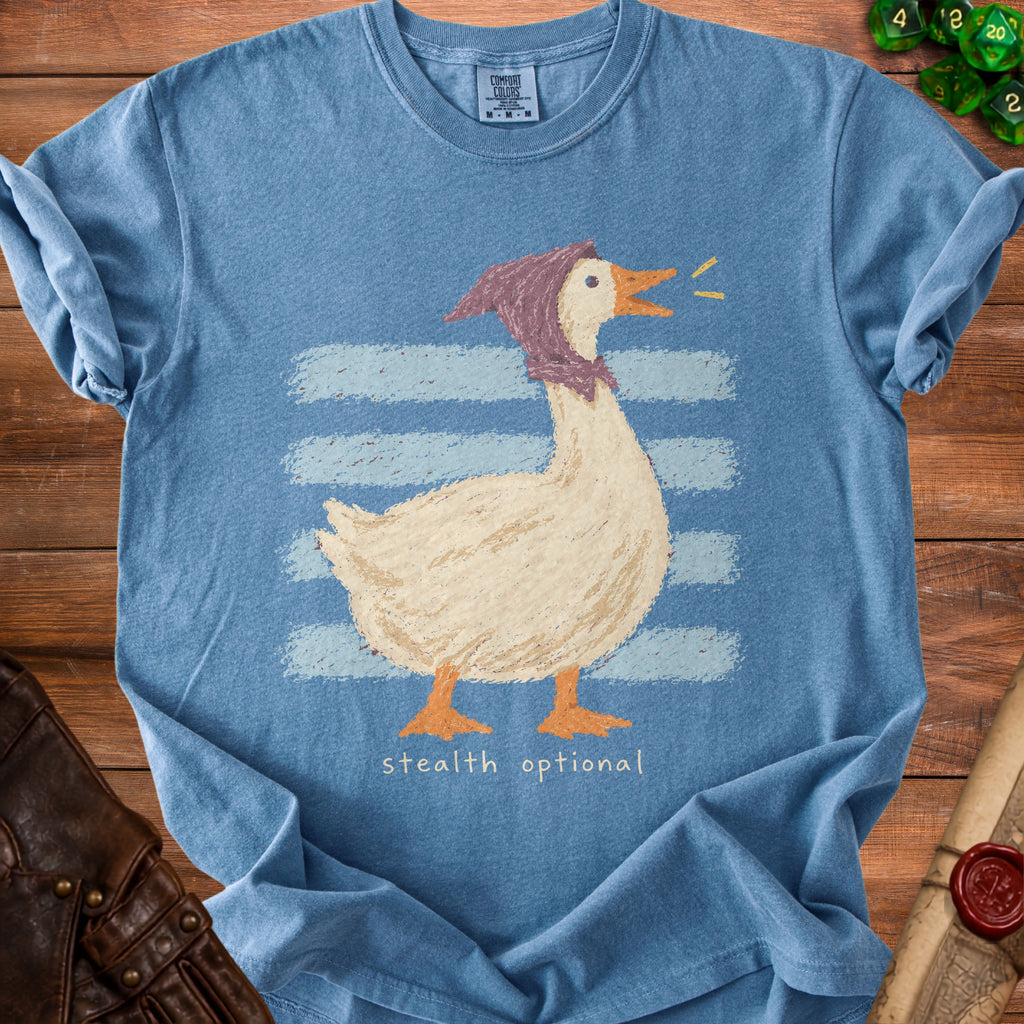 Blue t-shirt with a goose wearing a bonnet and the text "stealth optional".