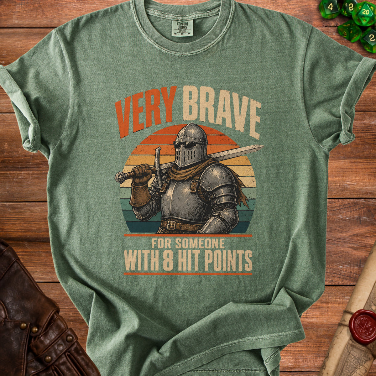 Green t-shirt with a knight graphic and text "Very Brave for Someone With 8 Hit Points".