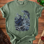 Green t-shirt with a wizard in a snowy landscape with a castle in the distance.