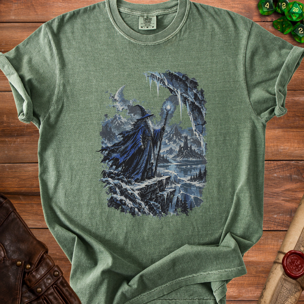 Green t-shirt with a wizard in a snowy landscape with a castle in the distance.