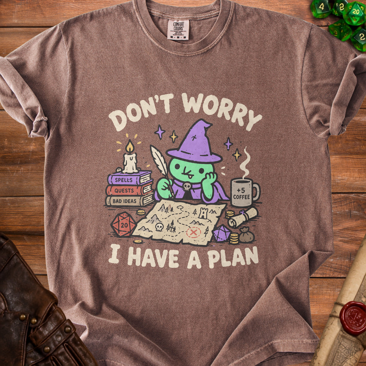 Brown t-shirt with cartoon witch and text "Don't worry I have a plan."