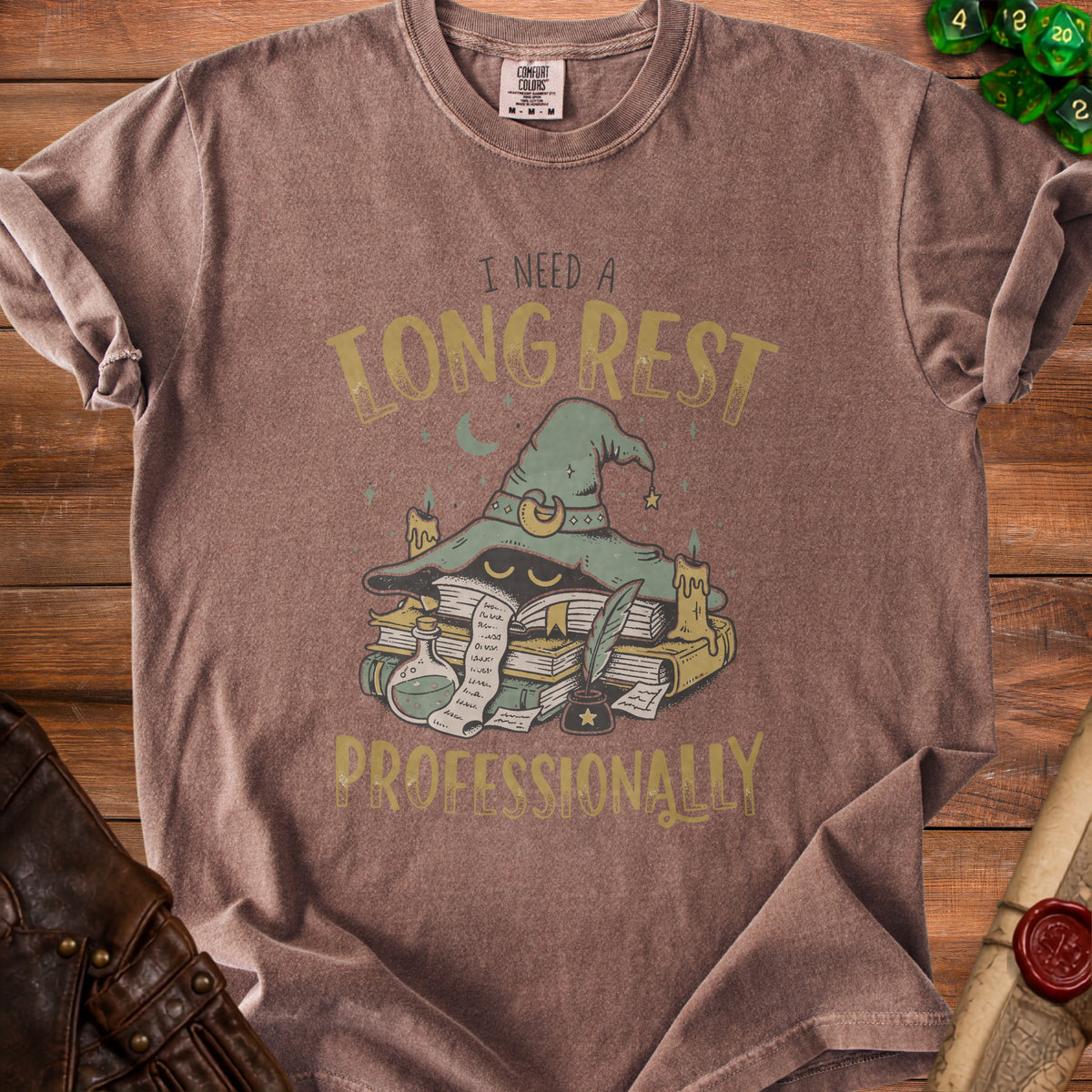 Brown t-shirt with "I need a long rest professionally" graphic and wizard hat illustration.