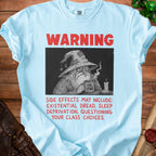 Light blue t-shirt with "WARNING" and an illustration of a wizard drinking from an "I'm Fine" mug.