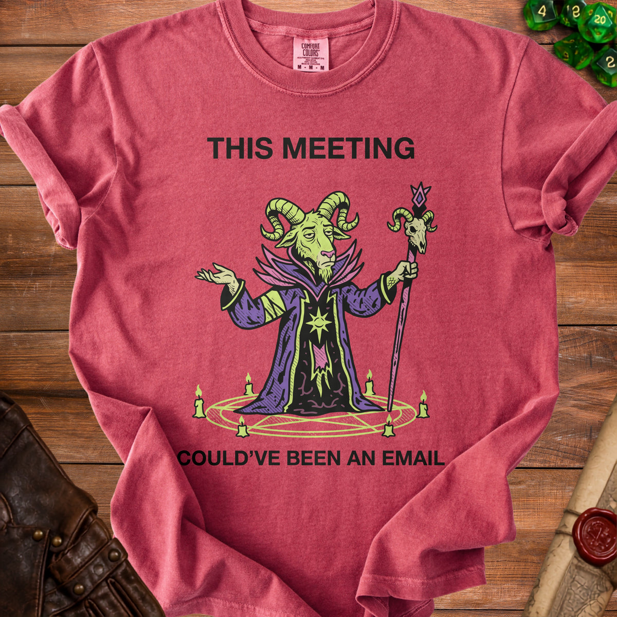 Red t-shirt with "This meeting could've been an email" and goat wizard graphic.