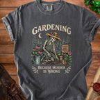 Dark gray t-shirt with skeleton gardening graphic and text "Gardening Because Murder Is Wrong".
