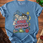 Blue t-shirt with wizard, cat, ghost, frog, and text "I cast minor inconvenience."