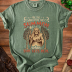 Green t-shirt with "Be the ancestor they summon when shit gets real" text.