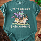 Teal t-shirt with graphic of knight goblin riding corgi, "OFF TO COMMIT SHENANIGANS".