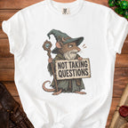 White t-shirt with wizard mouse holding "Not Taking Questions" sign.