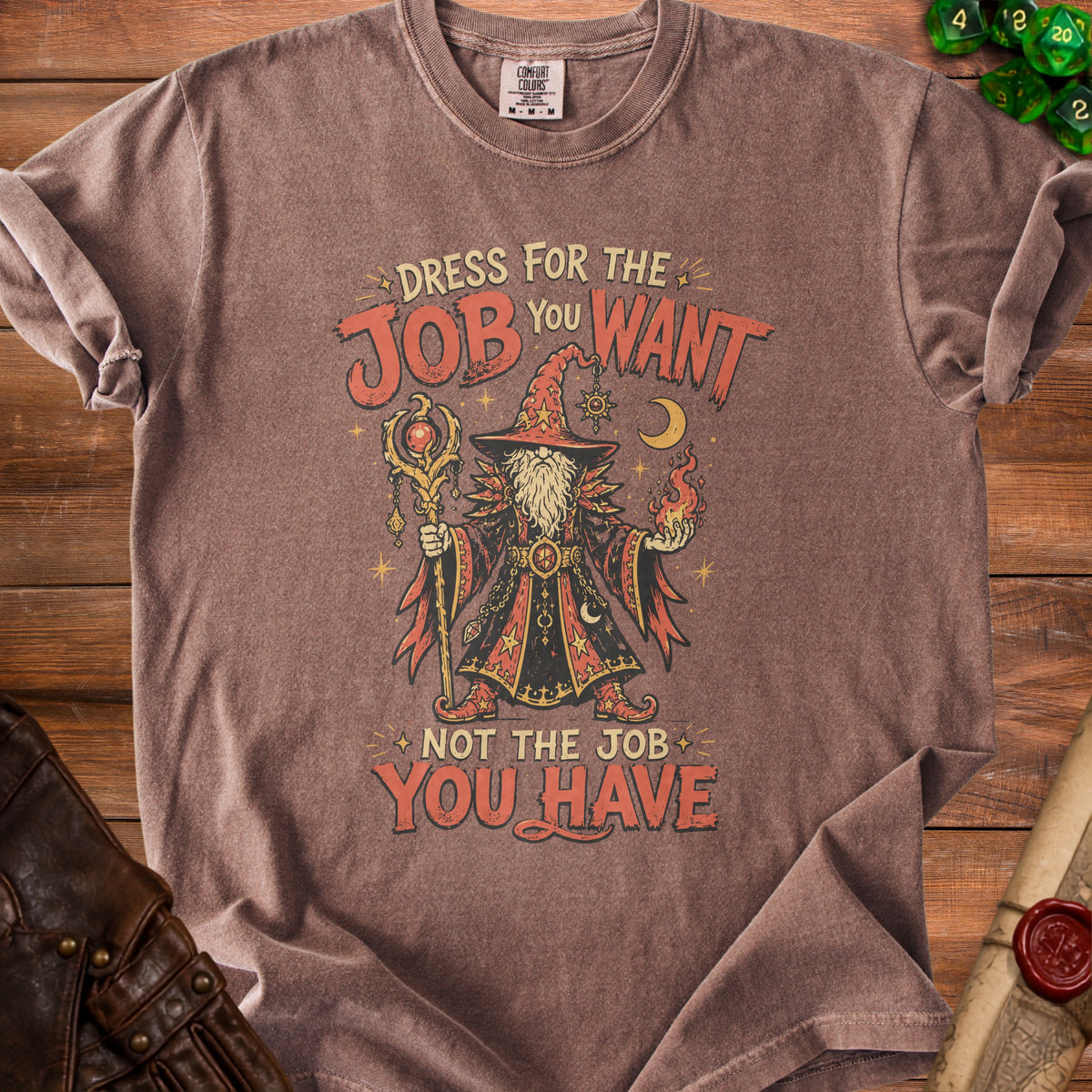 Brown t-shirt with wizard graphic and text "Dress for the Job You Want Not the Job You Have".