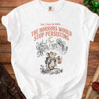White t-shirt with graphic of mouse holding lantern and text "The Horrors Would Stop Persisting".