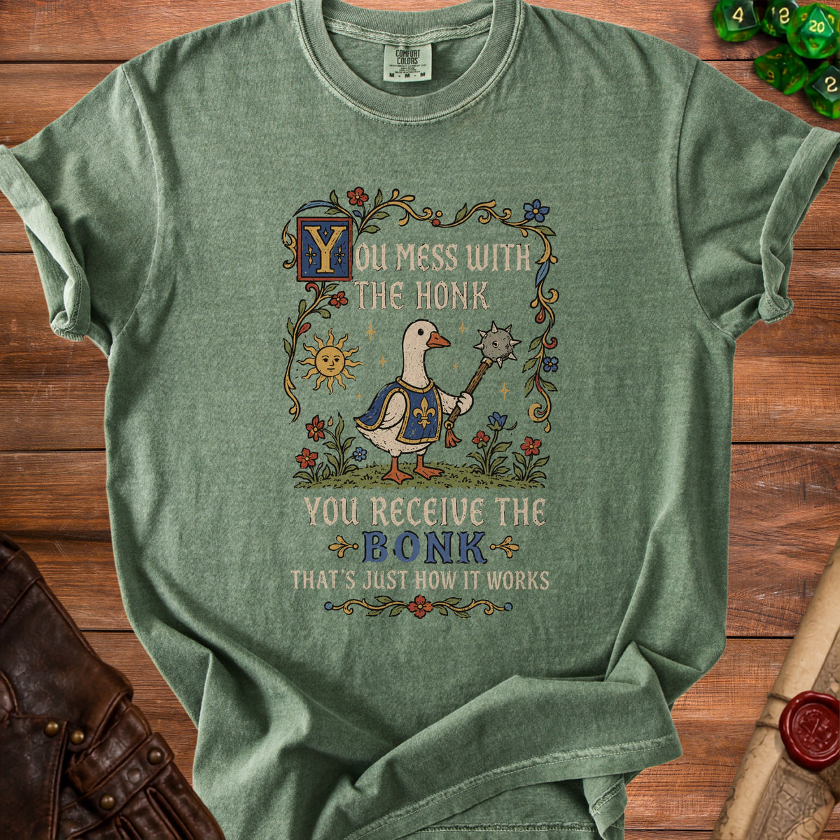 Green t-shirt with medieval art of a goose holding a mace, text reads "You Mess With the Honk You Receive the Bonk That's Just How It Works".