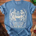 Blue t-shirt with graphic of three women examining a map, text reads "WOMEN WITH EXCELLENT BAD IDEAS".