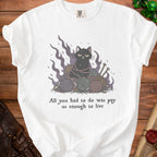 White t-shirt with a grumpy black cat in yarn, knitting needles, and smoke graphic.