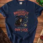 Navy t-shirt with wizard graphic and text "Things Don't Magically Happen. Create Your Own Luck."