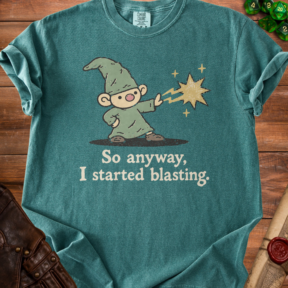 Green t-shirt with a cartoon gnome casting a spell, reading "So anyway, I started blasting."