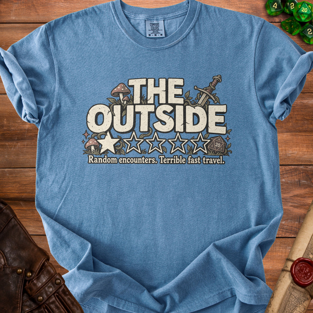 Blue t-shirt with "THE OUTSIDE" text, sword, mushrooms, and dice graphic.