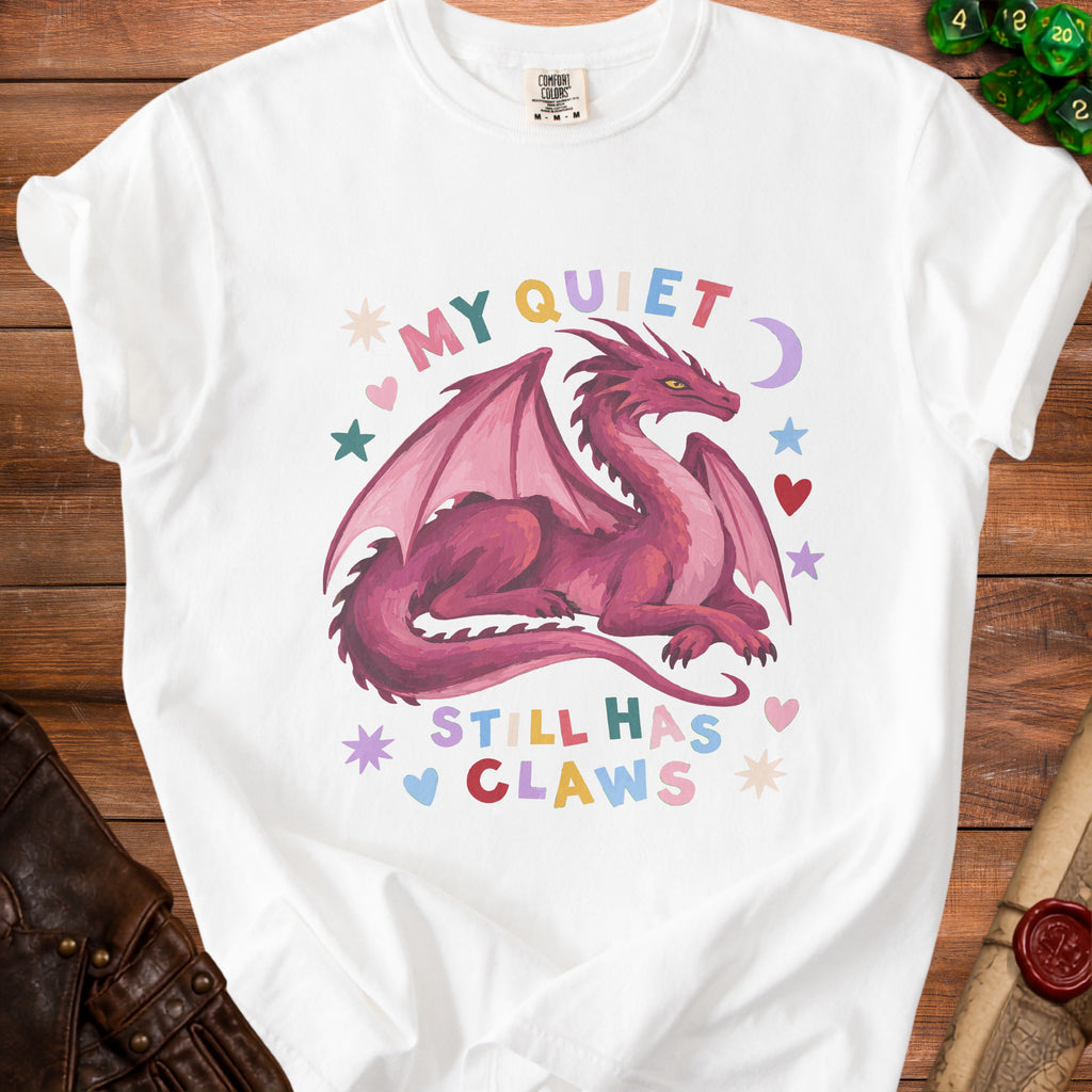 White t-shirt with a pink dragon graphic and the text "My Quiet Still Has Claws".