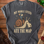 T-shirt graphic with a mouse knight riding a snail and eating a map.
