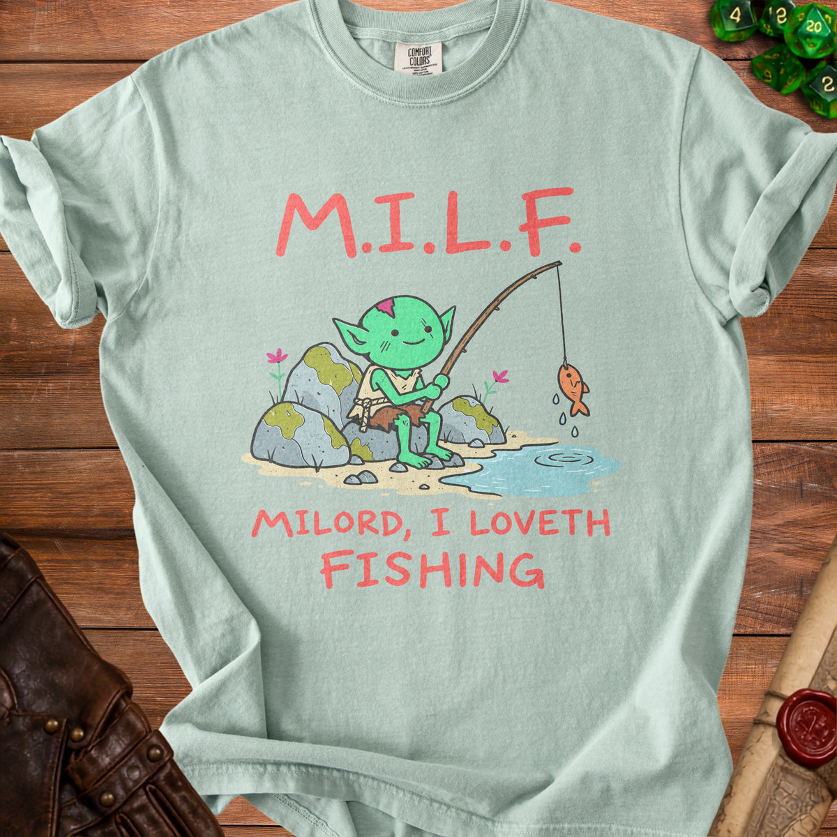 Light green t-shirt with cartoon goblin fishing and text "M.I.L.F. MILORD, I LOVETH FISHING".