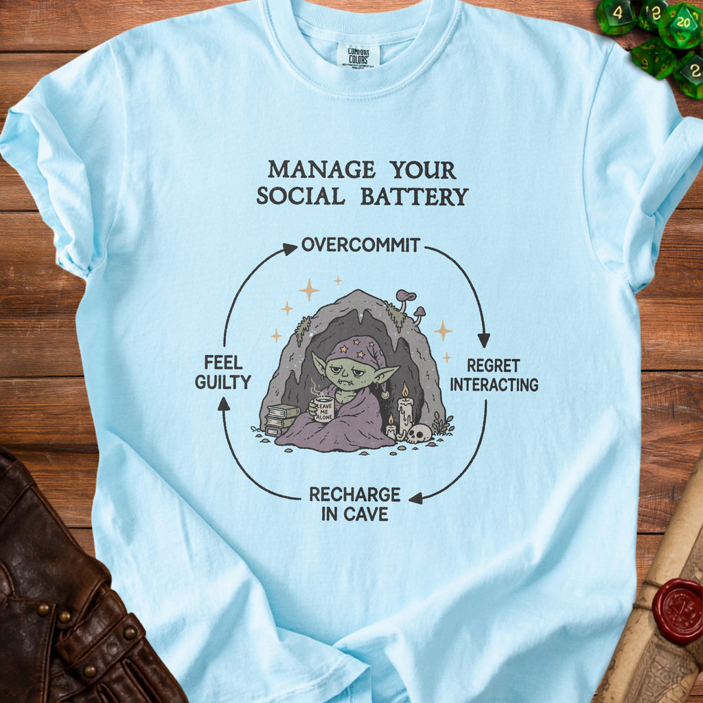 Light blue t-shirt with "Manage Your Social Battery" graphic and cycle diagram.