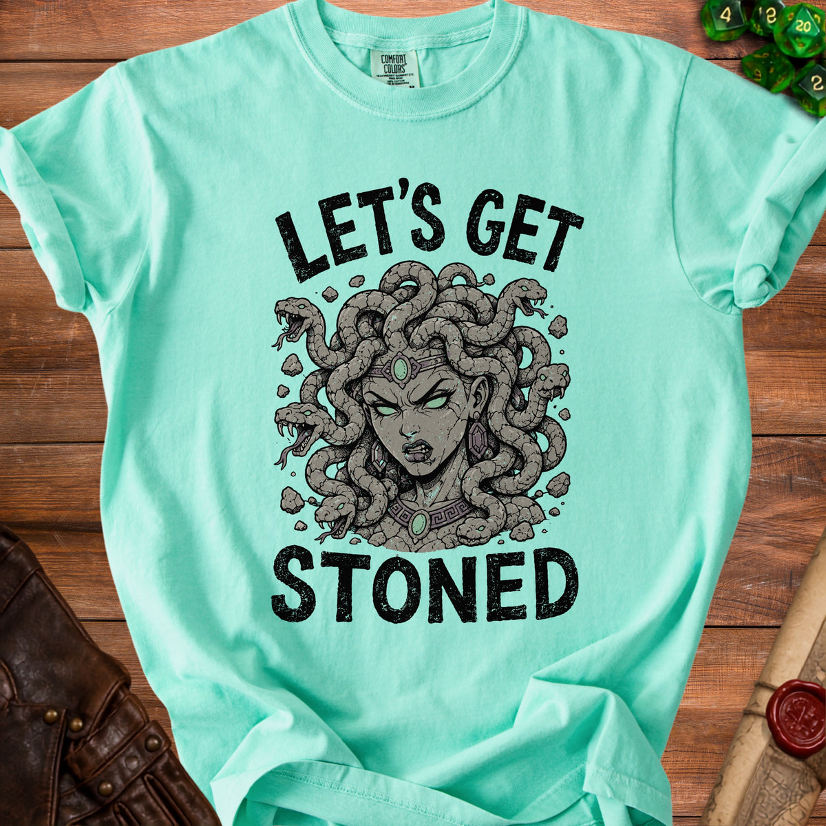 Aqua t-shirt with "LET'S GET STONED" and Medusa graphic.