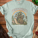 Light green t-shirt with "Socially Unavailable" and "gone foraging" text and goblin on snail graphic.