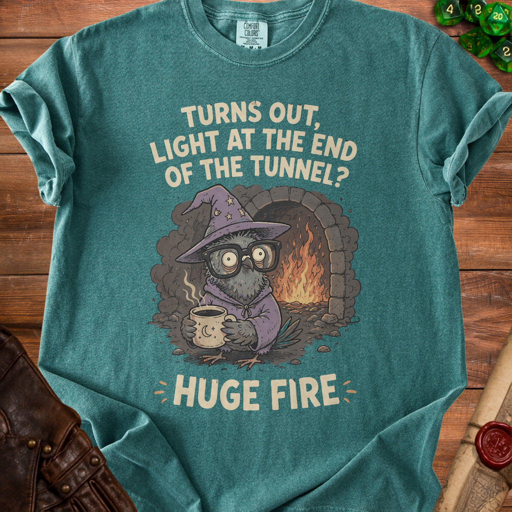 T-shirt with text "Turns out, light at the end of the tunnel? Huge fire." featuring a pigeon wizard.