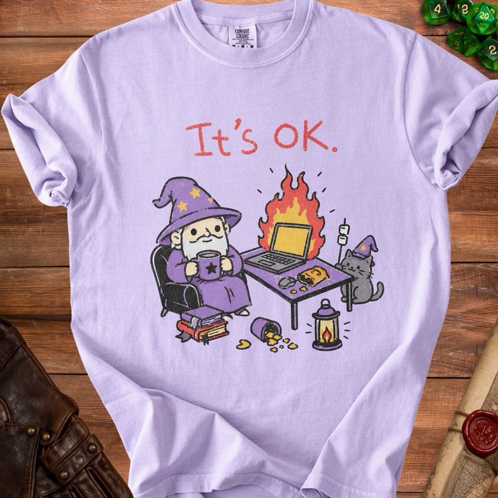 Purple t-shirt with wizard, cat, and burning laptop graphic that says "It's OK."