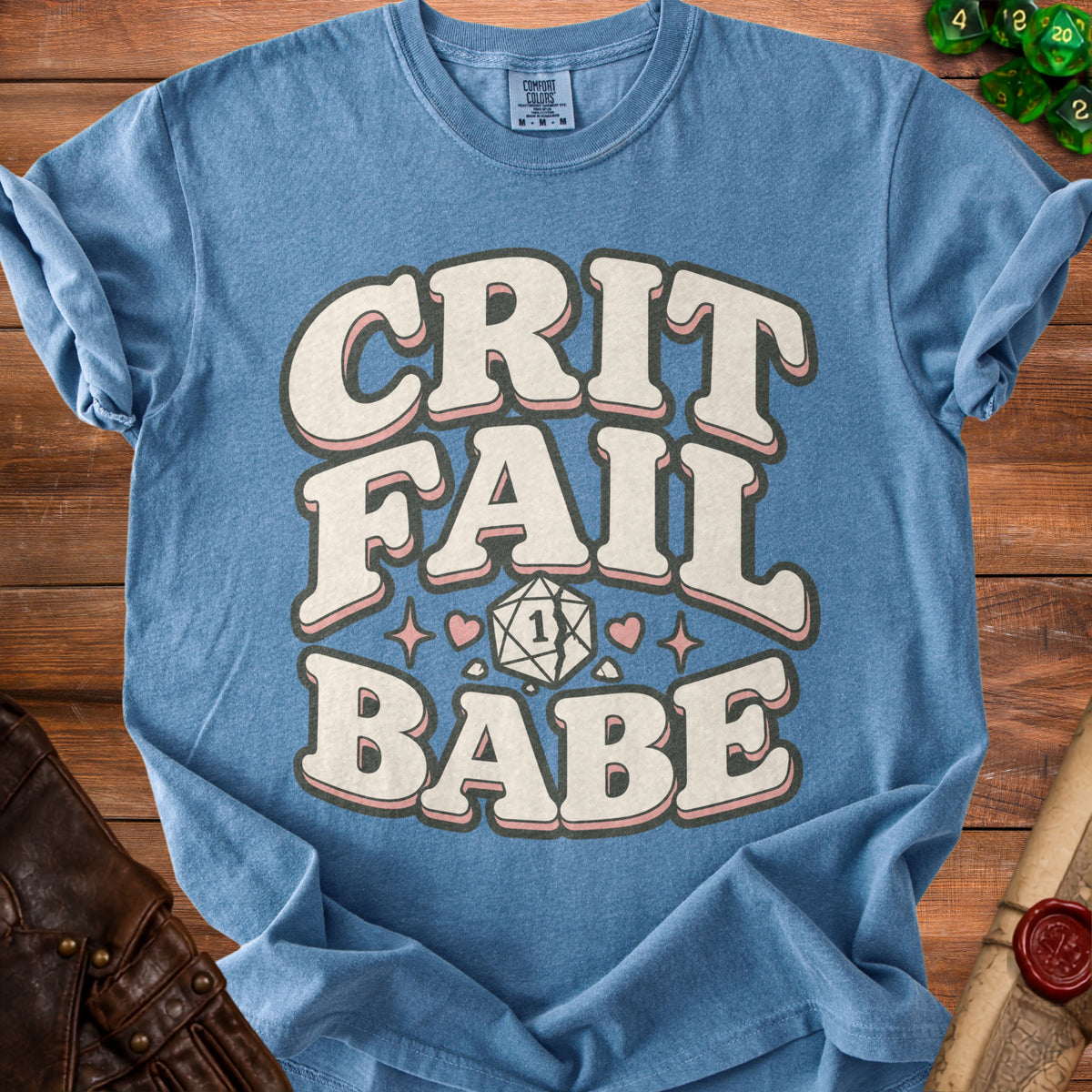 Blue t-shirt with "CRIT FAIL BABE" text and a D20 die.