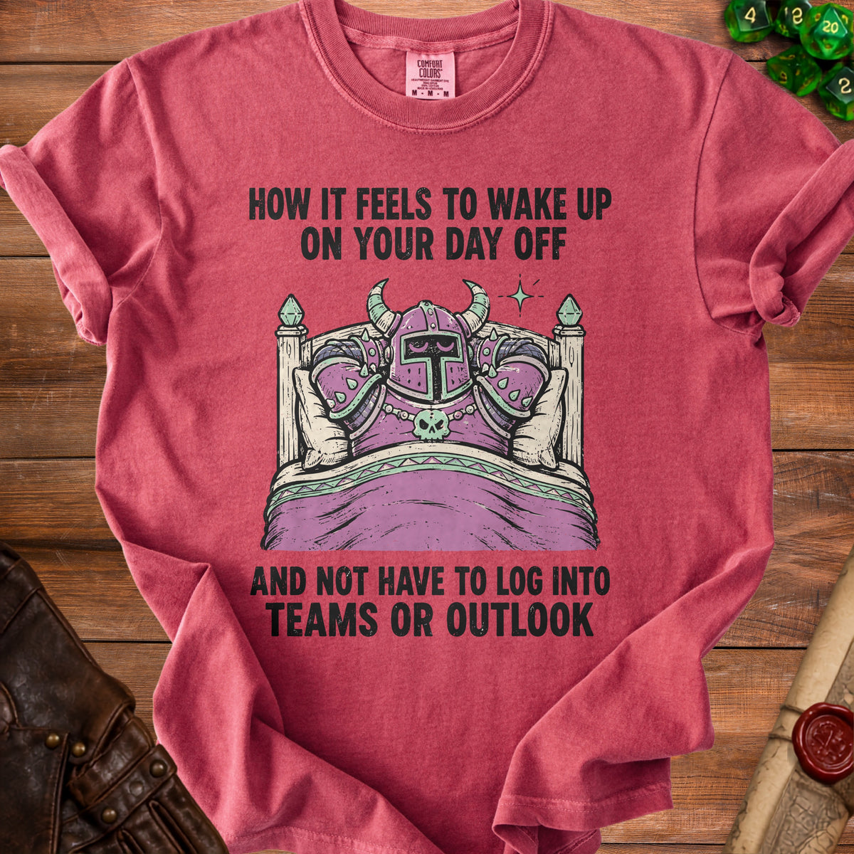 T-shirt with knight in bed graphic and text "How it feels to wake up on your day off."