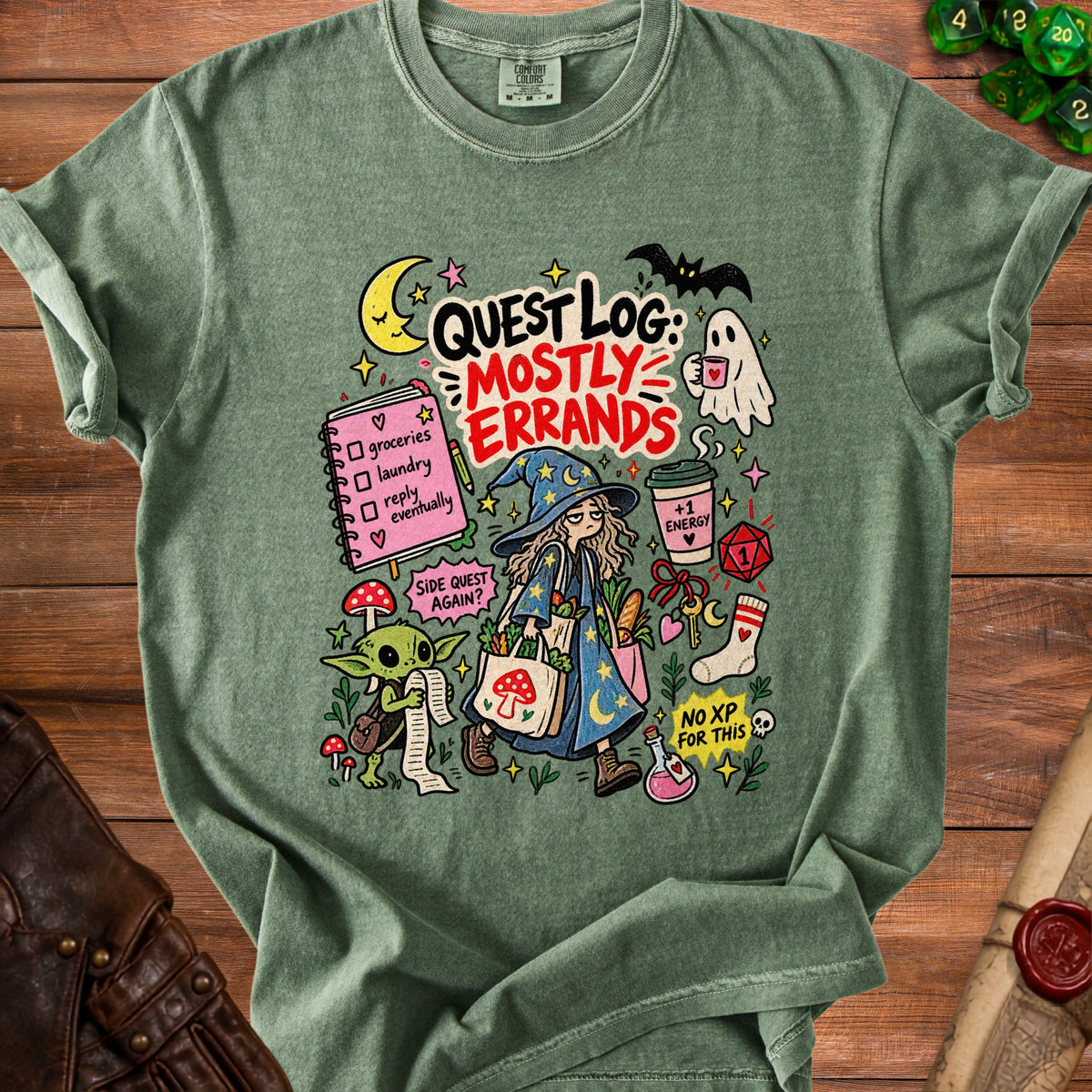 Green t-shirt with "Quest Log: Mostly Errands" cartoon art featuring a witch, goblin, and ghost.