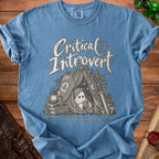 Blue t-shirt with "Critical Introvert" text, ghost in a tent, and dice.