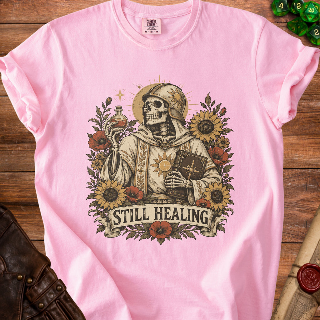 Skeleton in a robe holding a potion and book, with "STILL HEALING" text.