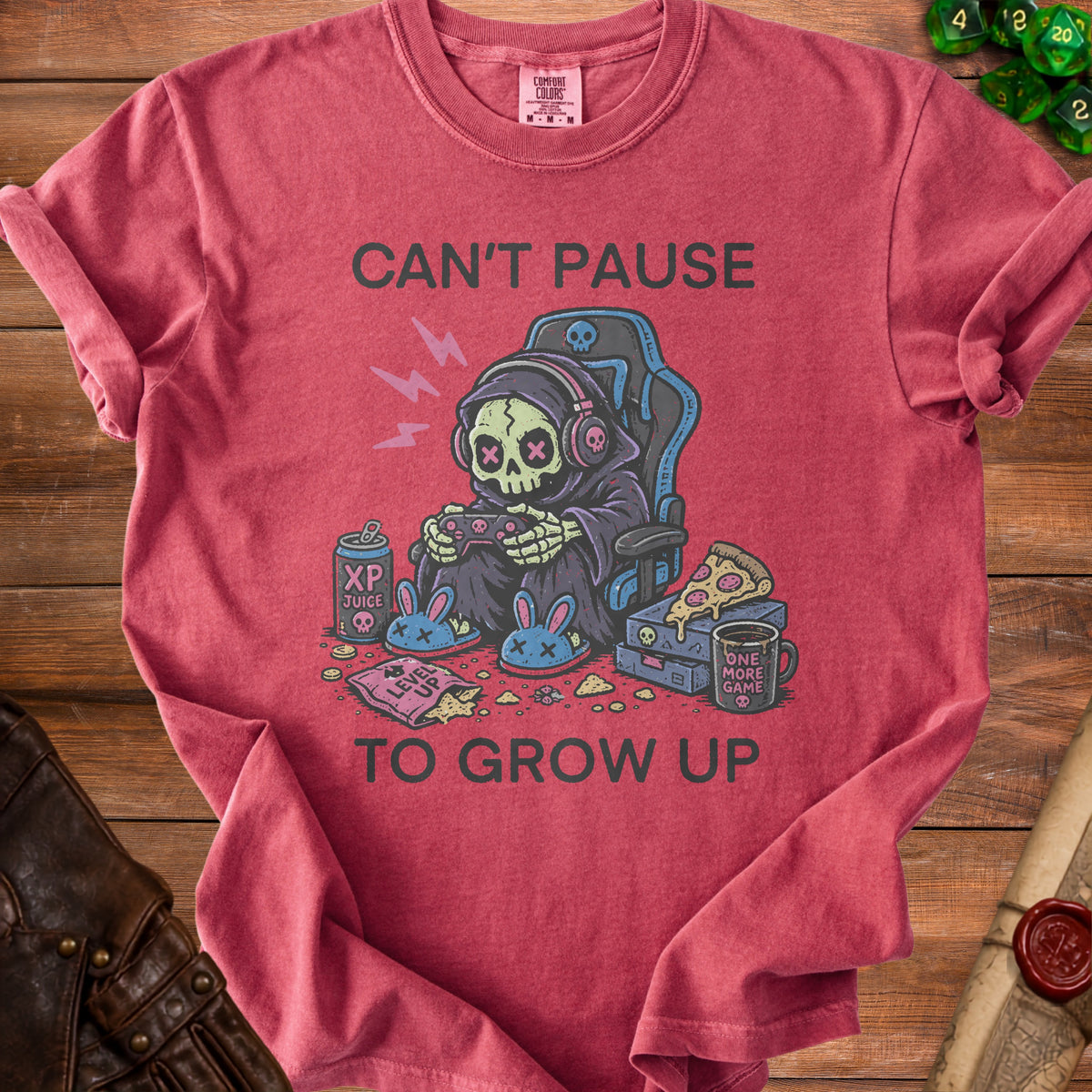 T-shirt with grim reaper gamer graphic and text "Can't Pause To Grow Up".