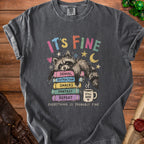 T-shirt with raccoon on books saying "It's Fine" and "Everything Is Probably Fine".
